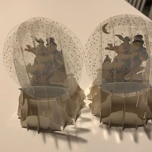 Paper snow globe.  Closes and opens